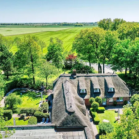아파트 Sky & Homes Wattlaeufer I Nordsee-auszeit Im Reetdachanwesen Mit Parkgarten Böhl
